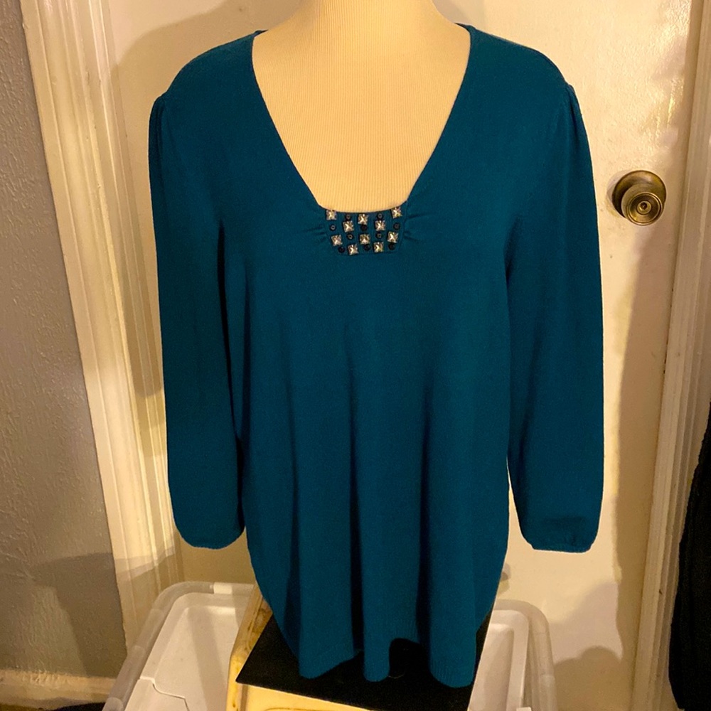 Lane Bryant sweater crew neck. 10 rhinestone and 10 beads size is 14/16 size.